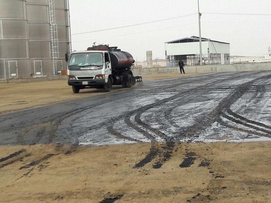 Water tanker truck supporting road construction works