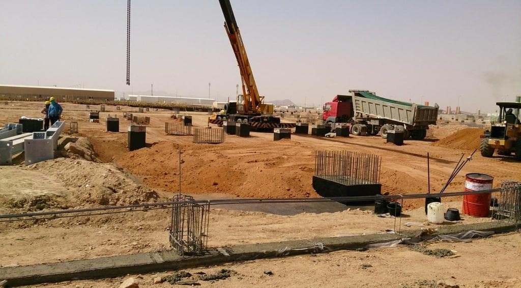 Site development works beside an industrial building