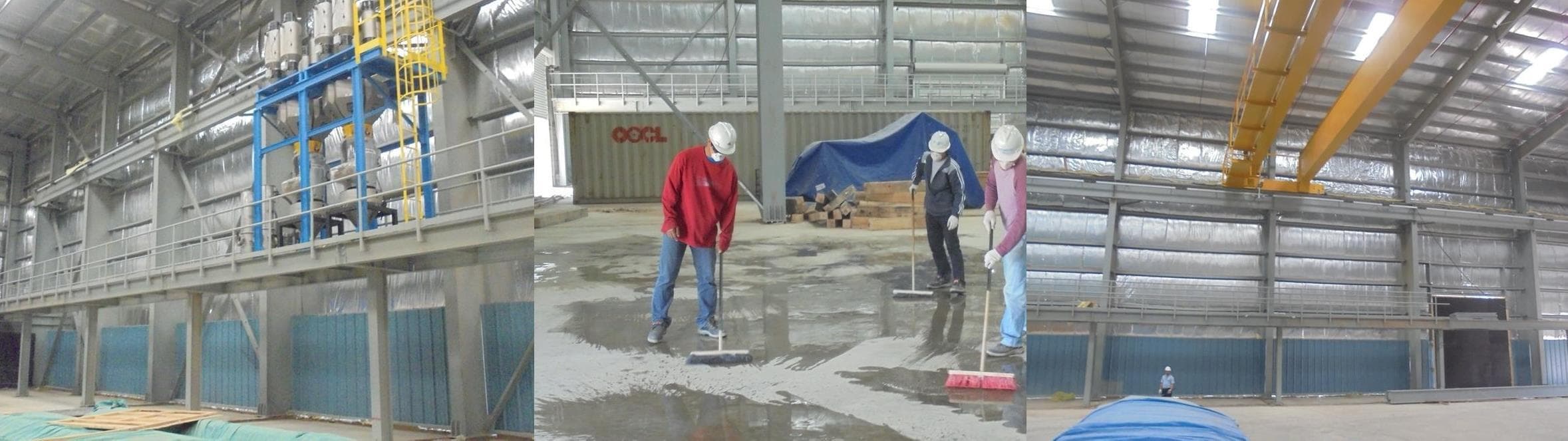 Workers cleaning a warehouse floor beneath steel framing
